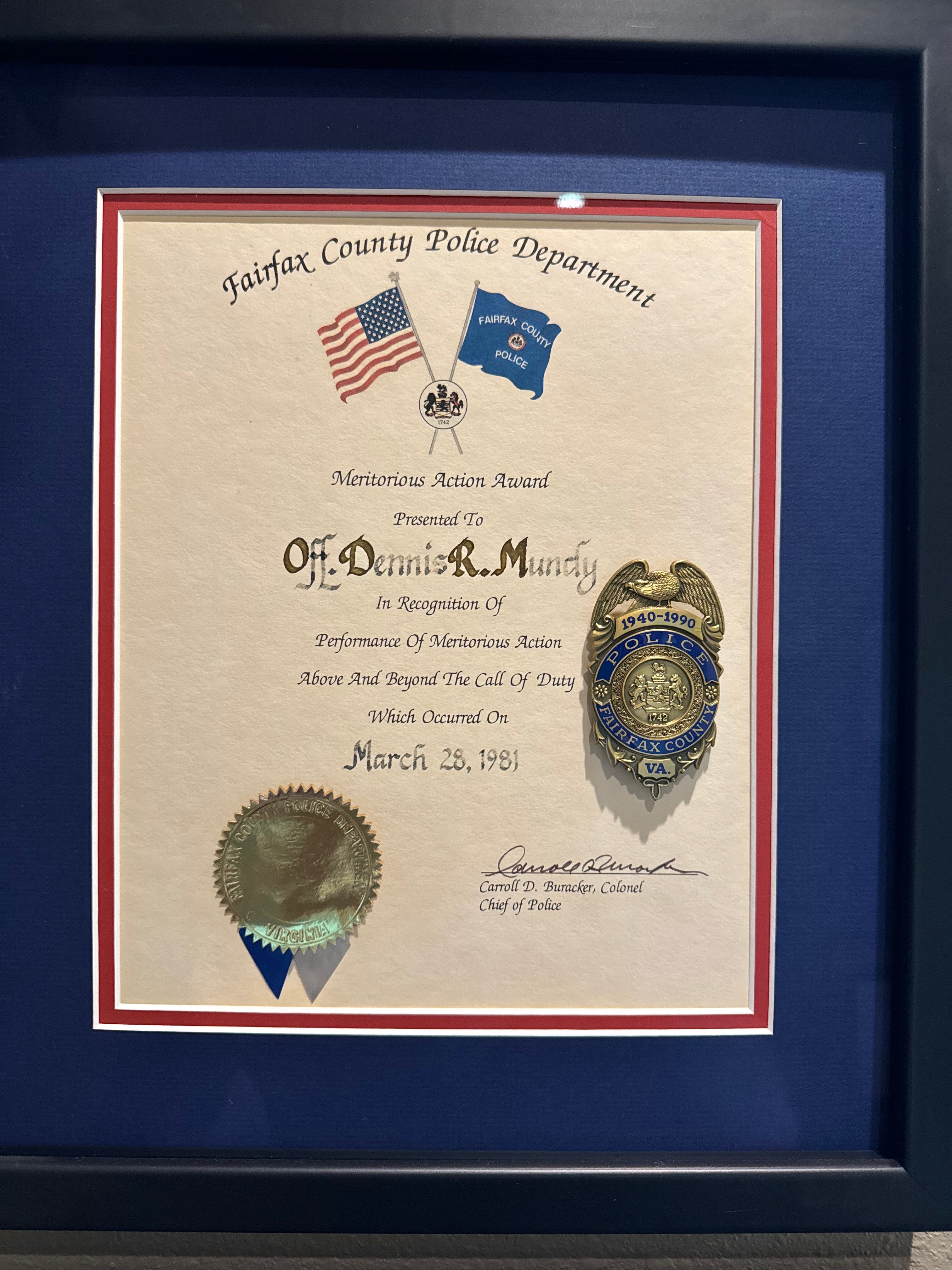 Meritorious Action Award presented to Officer Dennis R. Mundy by the Fairfax County Police Department for performance above and beyond the call of duty, March 28, 1981.